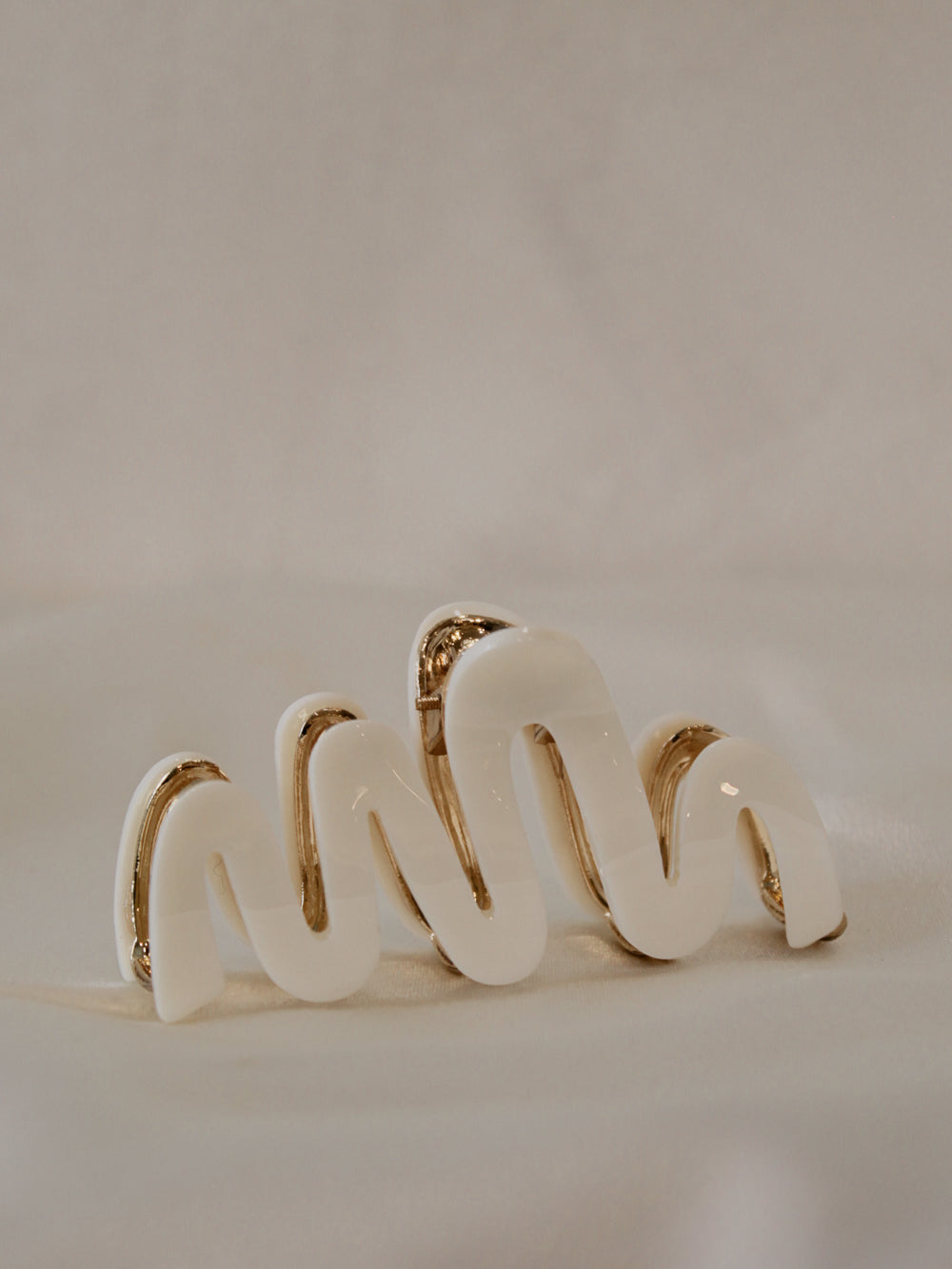 white claw clip with a wavy design  for women
