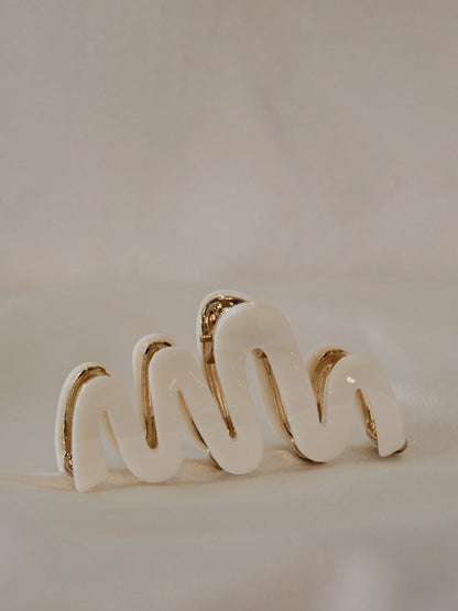 white claw clip with a wavy design  for women