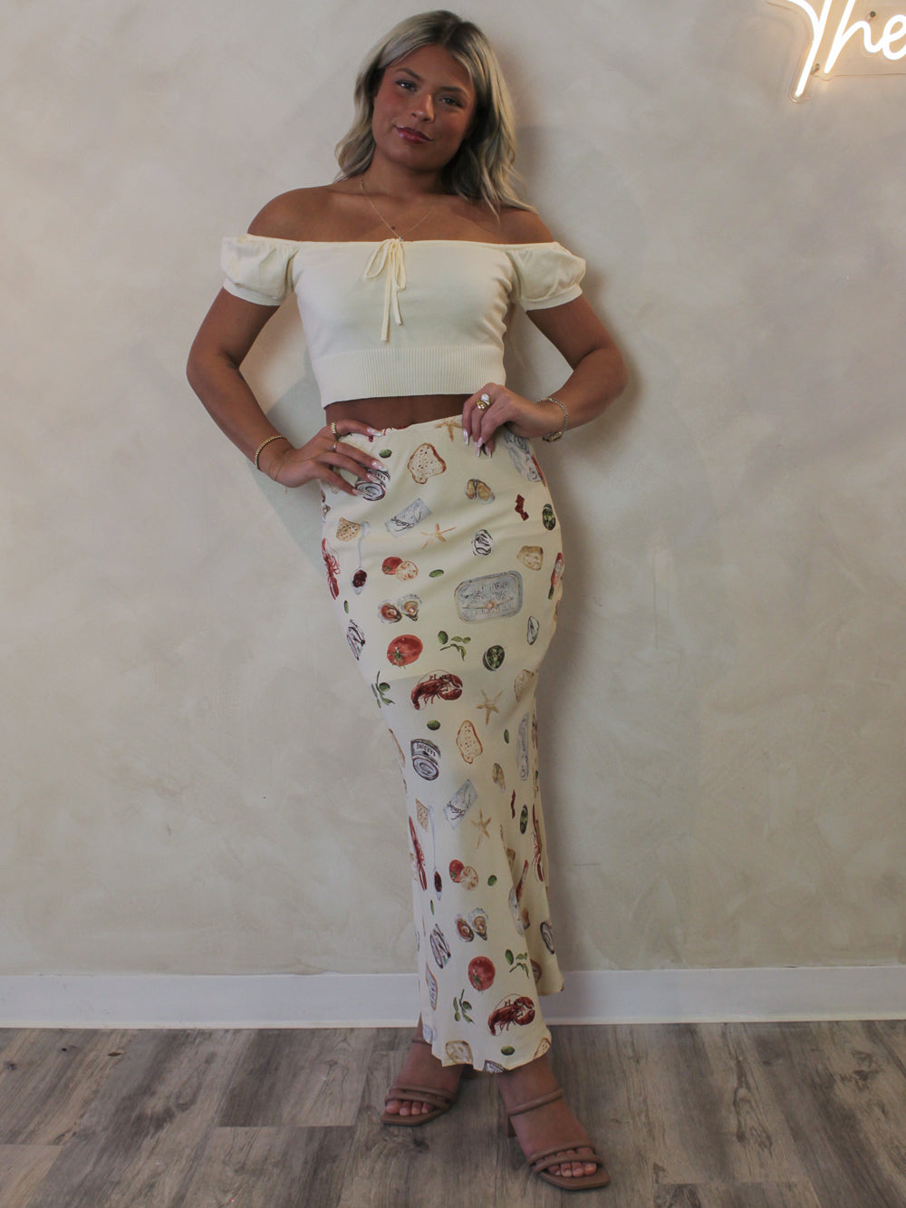 Model wearing a coastal print maxi skirt 